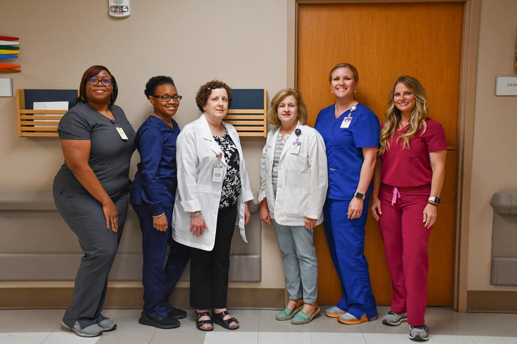 Hospital staff photo in hallway